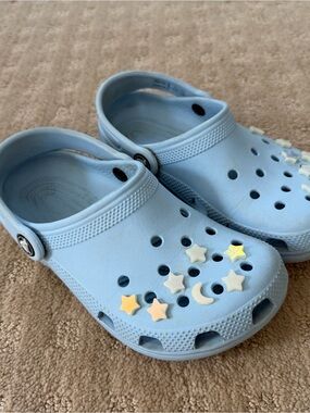 Crocs size 1 - Light Blue with Star & Moon Charms
